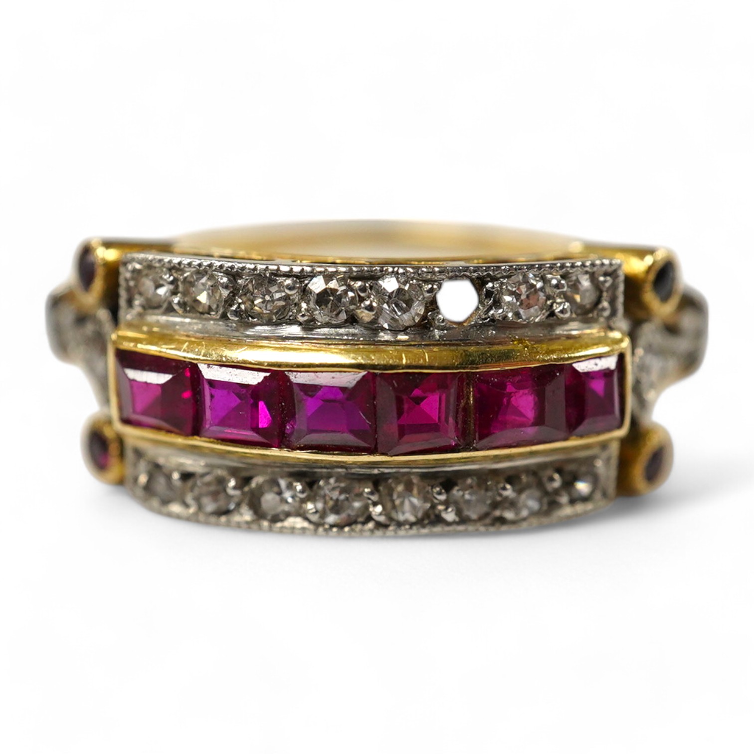 A 1940's? yellow metal, diamond and synthetic ruby set three row ring, (one diamond missing), size O, gross weight 3.7 grams. Condition - poor to fair